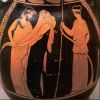 Ο Άδης - Πλούτωνας ρίχνει σπόρους στο οργωμένο χωράφι. Η Δήμητρα τον παρακολουθεί. 